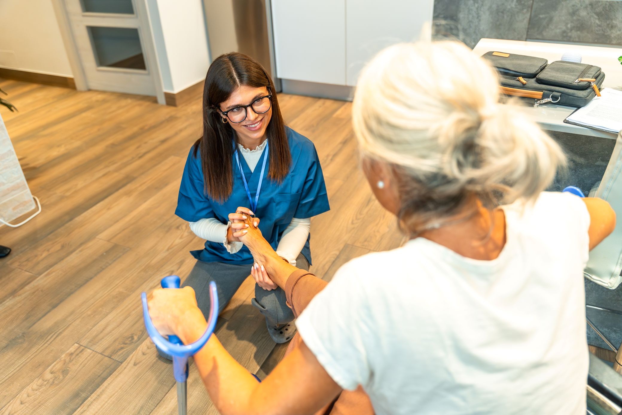 Assitance with specialist foot health checks for a care home resident